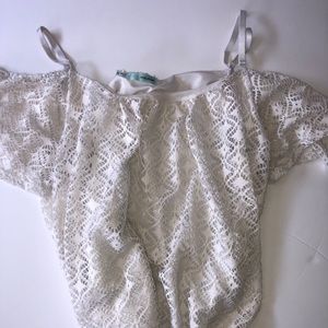 Lace off the shoulder shirt.